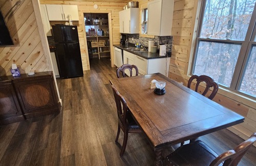Mammoth Spring Cabin | Cozy Cedar Cabin: Pet Friendly Retreat in the Ozarks