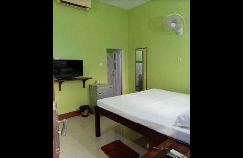 Kampot Apartment | Inviting Hideout: Child-Friendly Stay with Kitchen Amenities