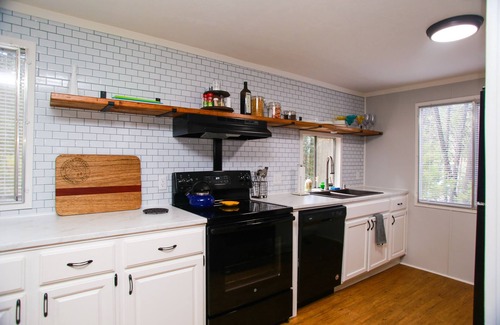 Garden Valley House | Hillside Hideaway: Retro Meets Modern, Steps to Pool & Golf