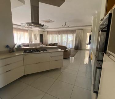 Hazyview House | Experience The House: Family-Friendly with Pool & 9.8 Rating