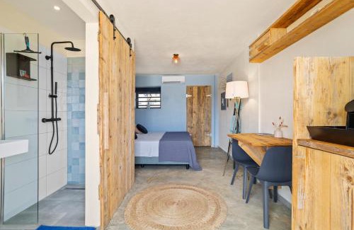 Playa Hotel | Eco-Friendly Oasis at The Hut Bonaire with Oceanfront Views