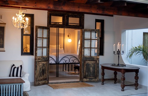 Plettenberg Bay Hotel | Experience Comfort at The Ivory Haus: Pool & Dining Await!