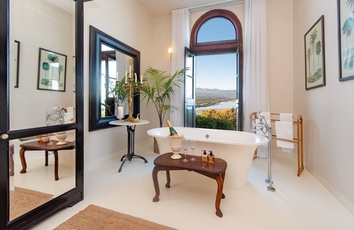 Plettenberg Bay Hotel | Experience Comfort at The Ivory Haus: Pool & Dining Await!