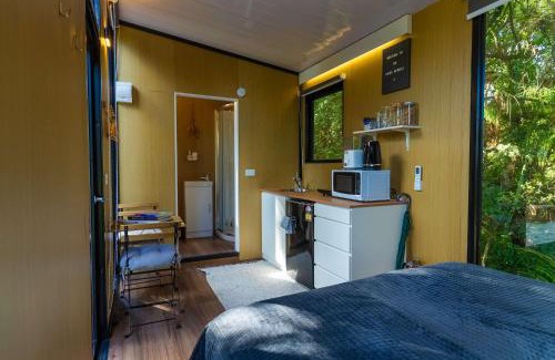 Waitoki House | Discover The Kauri Retreat 2: Family-Friendly Getaway