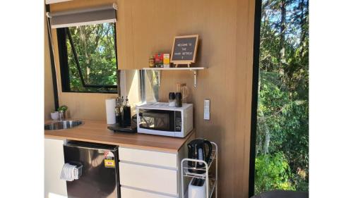 Waitoki House | Discover The Kauri Retreat 2: Family-Friendly Getaway
