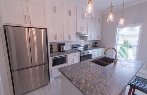 Belle Mina Apartment | Explore The Kennedy Suite C with Spa and Hot Tub Amenities