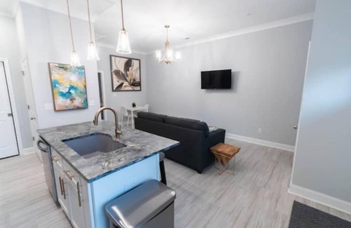 Belle Mina Apartment | Explore The Kennedy Suite C with Spa and Hot Tub Amenities
