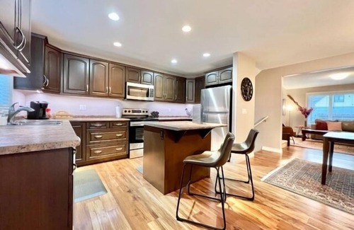 Saskatoon House | Kid Rock Home: Modern Stay with Family-Friendly Amenities