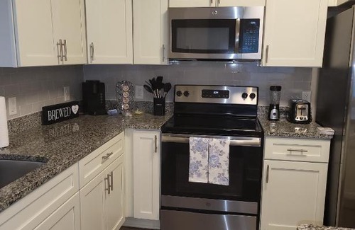 Northeast Raleigh Apartment | Indulgent King & Queen Suite with Pool and Pet-Friendly Perks