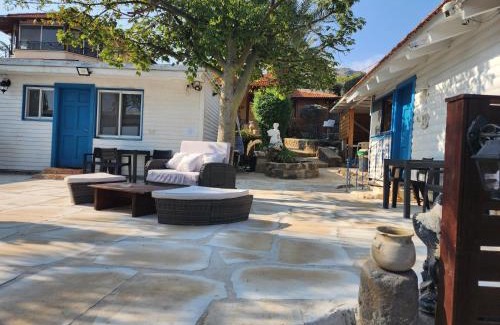 Migdal Ski Chalet | Experience The Lake House: Oceanfront Retreat with Pool