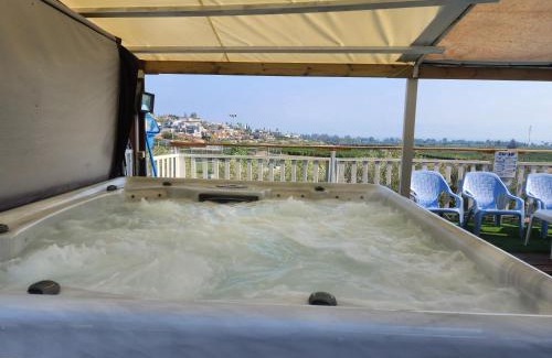 Migdal Ski Chalet | Experience The Lake House: Oceanfront Retreat with Pool
