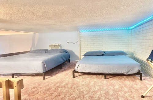 Sunrise Beach House | Discover The Lazy Loft: Relaxing Dock & Family-Friendly Stay
