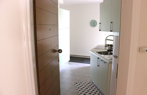 Kato Stalos Apartment | Beachside "LifeGuard" Flat with Pool & Ocean Views