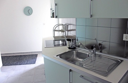 Kato Stalos Apartment | Beachside "LifeGuard" Flat with Pool & Ocean Views