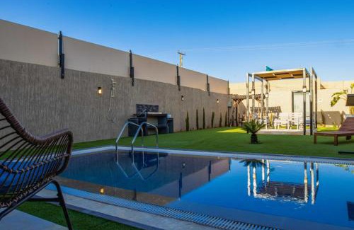 Sahab House | Cozy Cottage Chalet B3: Family-Friendly Retreat with Pool