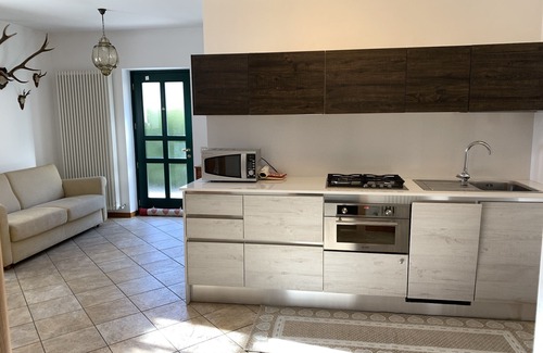Prade Apartment | Cozy Little Green House in Vanoi: Family-Friendly Retreat
