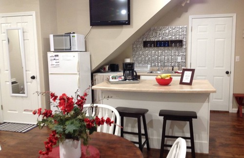 Marshall House | Discover The Little Red Cottage in a Quaint Neighborhood