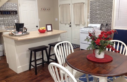 Marshall House | Discover The Little Red Cottage in a Quaint Neighborhood