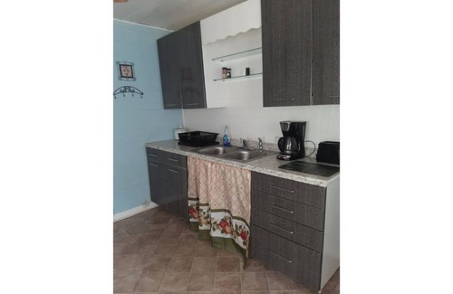 Tallassee House | Cozy Oceanview Retreat: Guest Rated 9.8 at The Little White Cottage
