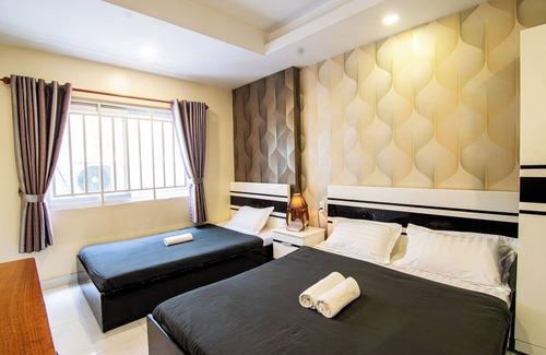 Downtown Ho Chi Minh City House | Cozy Retreat at The Local Home with Family-Friendly Perks