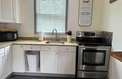 Roswell Apartment | Relax at The Lodge on Canton Street with Pool Access