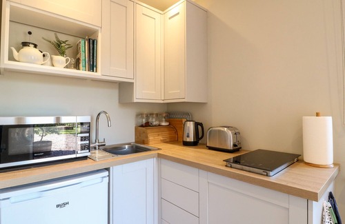 Checkley Cottage | Pet-Friendly Lodge at Middleton House with Garden Retreat