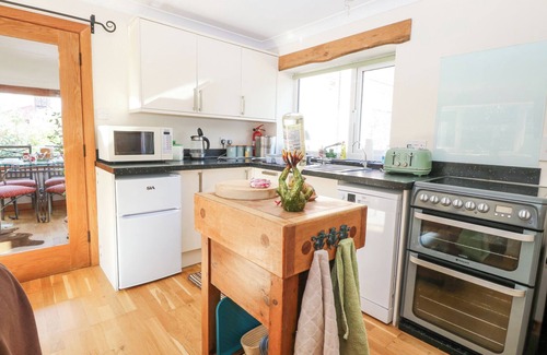 Tunstead Cottage | Discover The Lodge: Family-Friendly with Spa & Breakfast