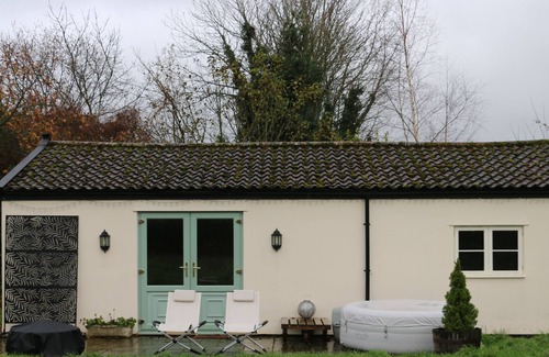 East Harling Cottage | Relaxing Retreat at The Lodge with Hot Tub & Private Garden