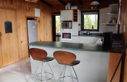 Hatfields Beach House | Idyllic Log Cabin Resort with Ocean View and Spa Amenities