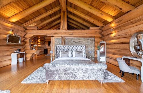 Bathgate Ski Chalet | Cozy Log Cabins at The Vu with Hot Tub & Fireplace