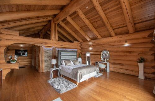 Bathgate Ski Chalet | Cozy Log Cabins at The Vu with Hot Tub & Fireplace