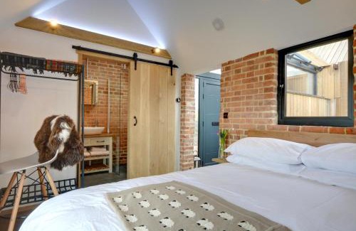 Stone in Oxney House | Experience The Lookers Legacy: Family and Pet-Friendly Retreat