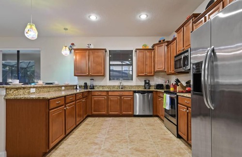 Davenport House | Discover The Magic Mansion: 6BR Resort Home with Pool