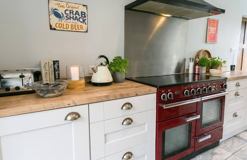 Bryngwran Cottage | The Manor - a hot tub that sleeps 8 guests in 3 bedrooms