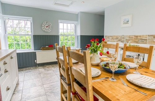 Bryngwran Cottage | The Manor - a hot tub that sleeps 8 guests in 3 bedrooms