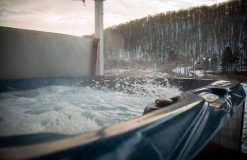 Ellicottville House | Discover The Maples: Pet-Friendly Retreat with Hot Tub & Views