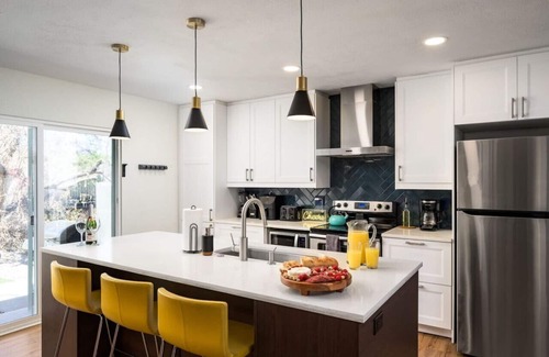 Arvada House | Experience The MCM Movie Manor with Backyard & Theater