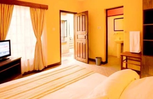 Nkubu Hotel | Discover The Meru House: Family-Friendly with Kitchen Amenities