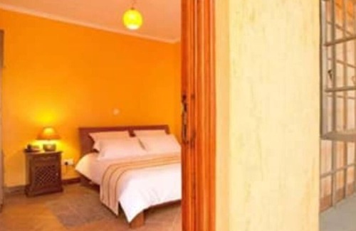 Nkubu Hotel | Discover The Meru House: Family-Friendly with Kitchen Amenities