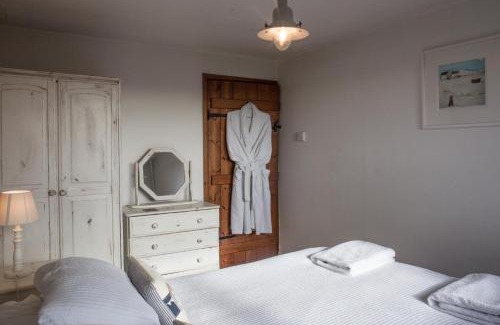 Hartland House | Cozy Oceanfront Retreat: The Milking Parlour Awaits You