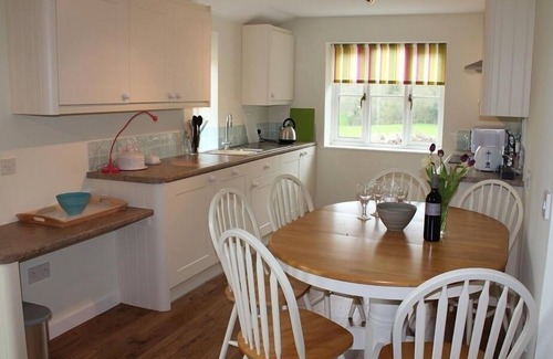 West Knoyle Cottage | Pet-Friendly Retreat: The Milking Parlour with Garden