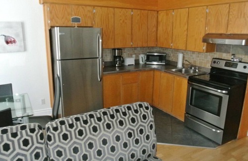 Plateau Mont Royal House | Discover The Mont-Royal: Child-Friendly Apartment Bliss