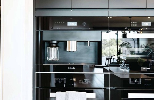 Fingal House | Elegant Moonah Residence with 6 Bedrooms and Scenic Views
