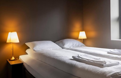 Vestmannaeyjar Apartment | Discover The New Post Office: Family-Friendly Retreat