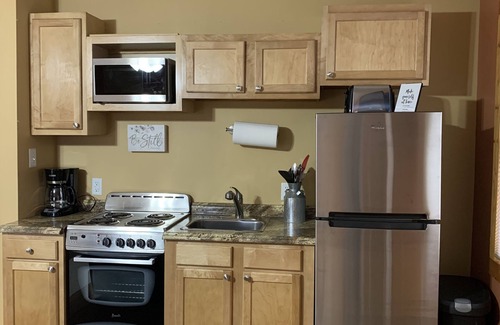 Fairland Apartment | Highly Rated The Nigh Place Studio with King Bed & Kitchen