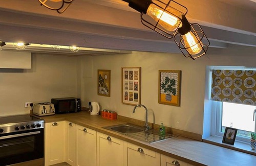 Saint Asaph Apartment | Gather with Friends at The North Wales Gathering - Hot Tub Fun