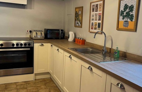 Saint Asaph Apartment | Gather with Friends at The North Wales Gathering - Hot Tub Fun