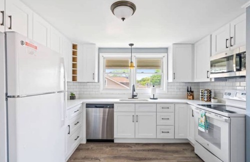 Norwood Park East Apartment | Prime Location in Norwood Park with Spa and Workspace!