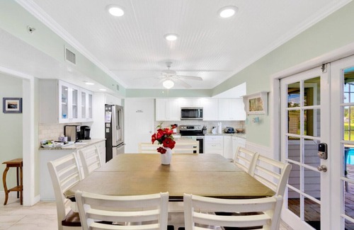 Lakeview Village House | Experience The Oak House: Waterfront Retreat with Heated Pool