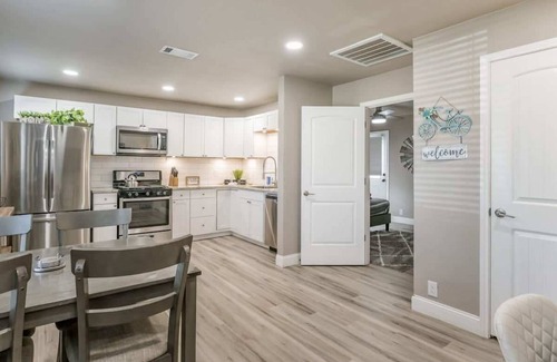 Amarillo House | Experience The Oasis: Hot Tubs, Mini-Golf & 2 Kitchens